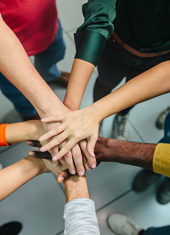 Group of hands forming a bond,Group of hands forming a bond