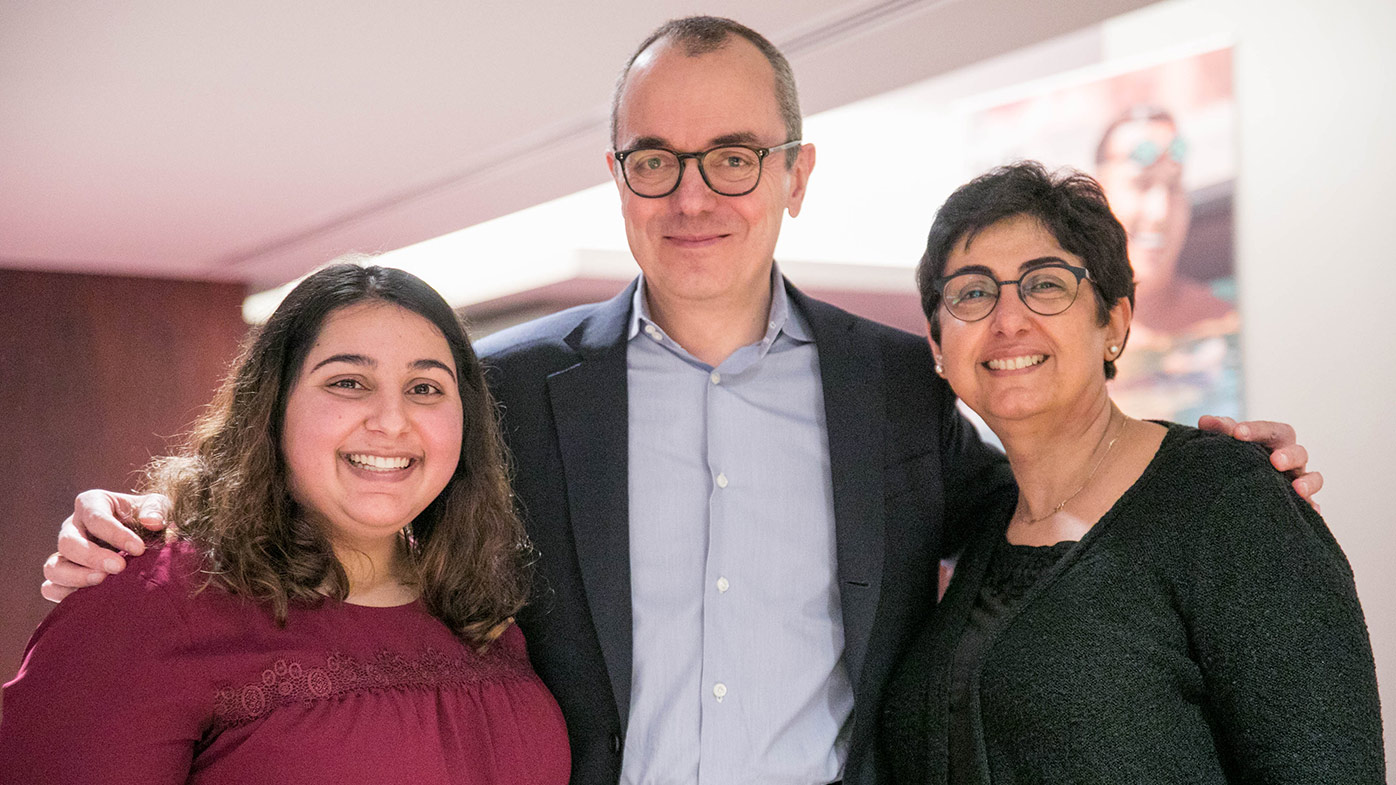 CEO Giovanni Caforio joins patient Mitra (on left), and her mom Faranak, who is a scientist at Bristol-Myers Squibb.
