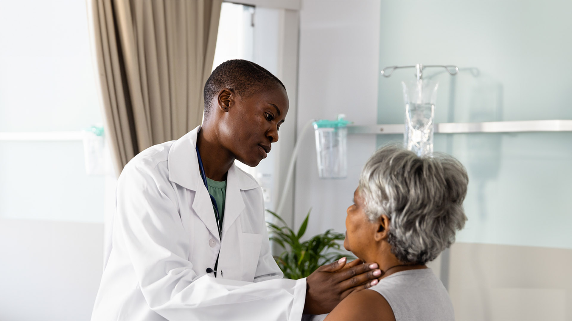Doctor in office discussing options with patient