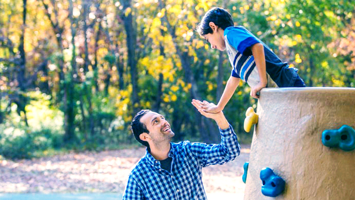 Father and son on a playground