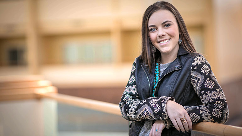 Tiffany, age 21, lives a full life despite treatments for cancer as adolescent.